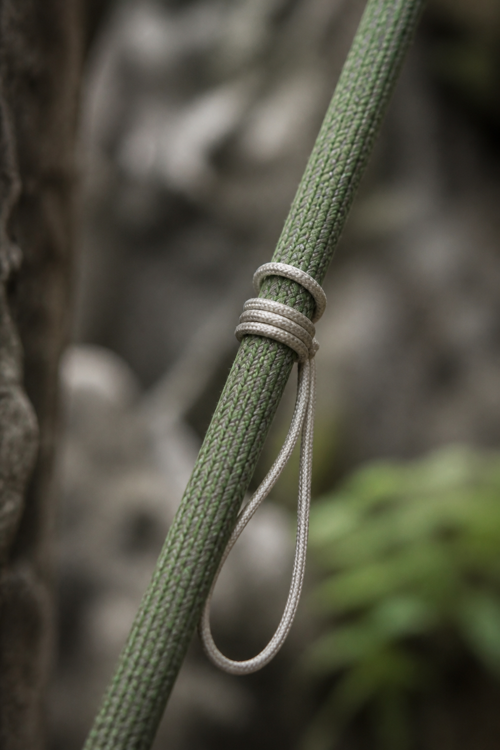 A prusik loop of thin cord wrapped around a thicker climbing rope